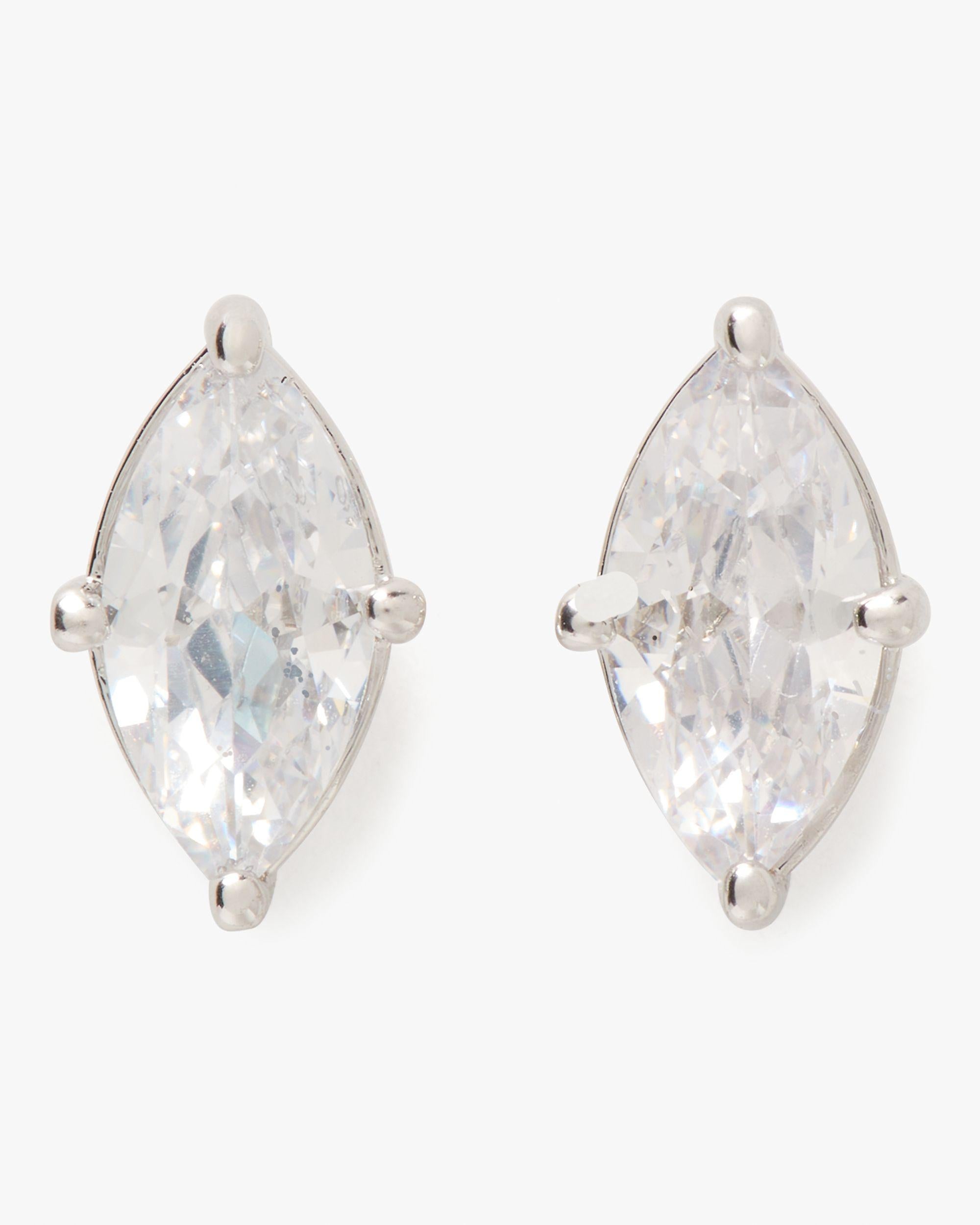 signature solitaire studs